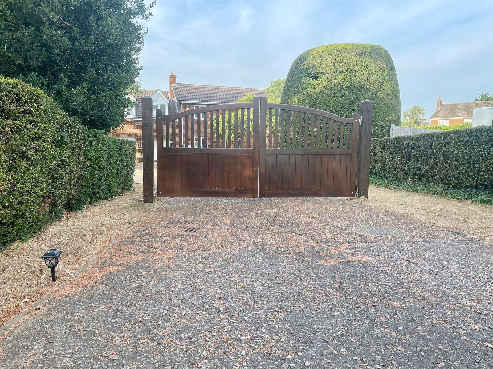 Timber gate installation by Walkers Exteriors and Building